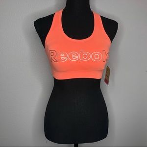 Reebok orange sports bra w/ silver lettering